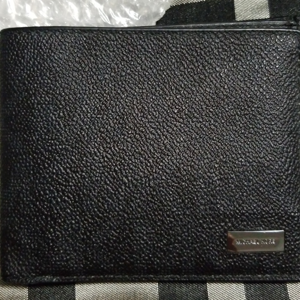 Michael Kors Used black Man wallet.